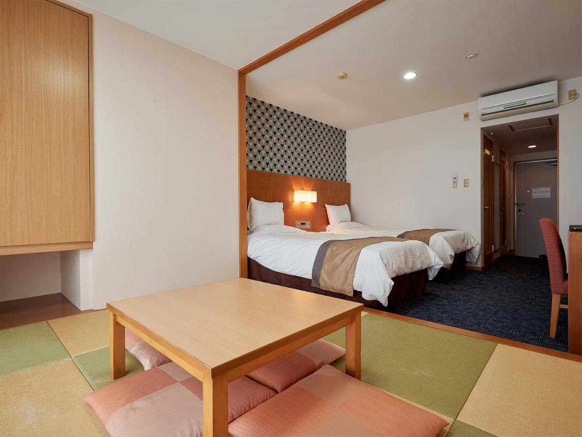 Hotel Murasakimura Yomitan Exterior photo